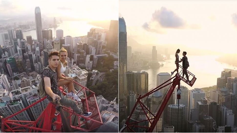 Russian couple’s daredevil selfies atop Hong Kong’s highest crane are breathtaking!